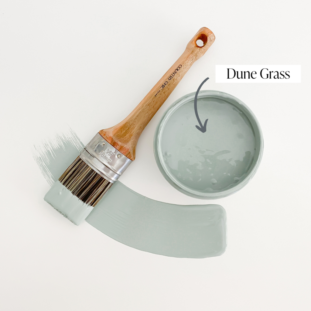 Top view of an open 16oz jar of Country Chic Chalk Style All-In-One Paint in the color Dune Grass. Muted green.