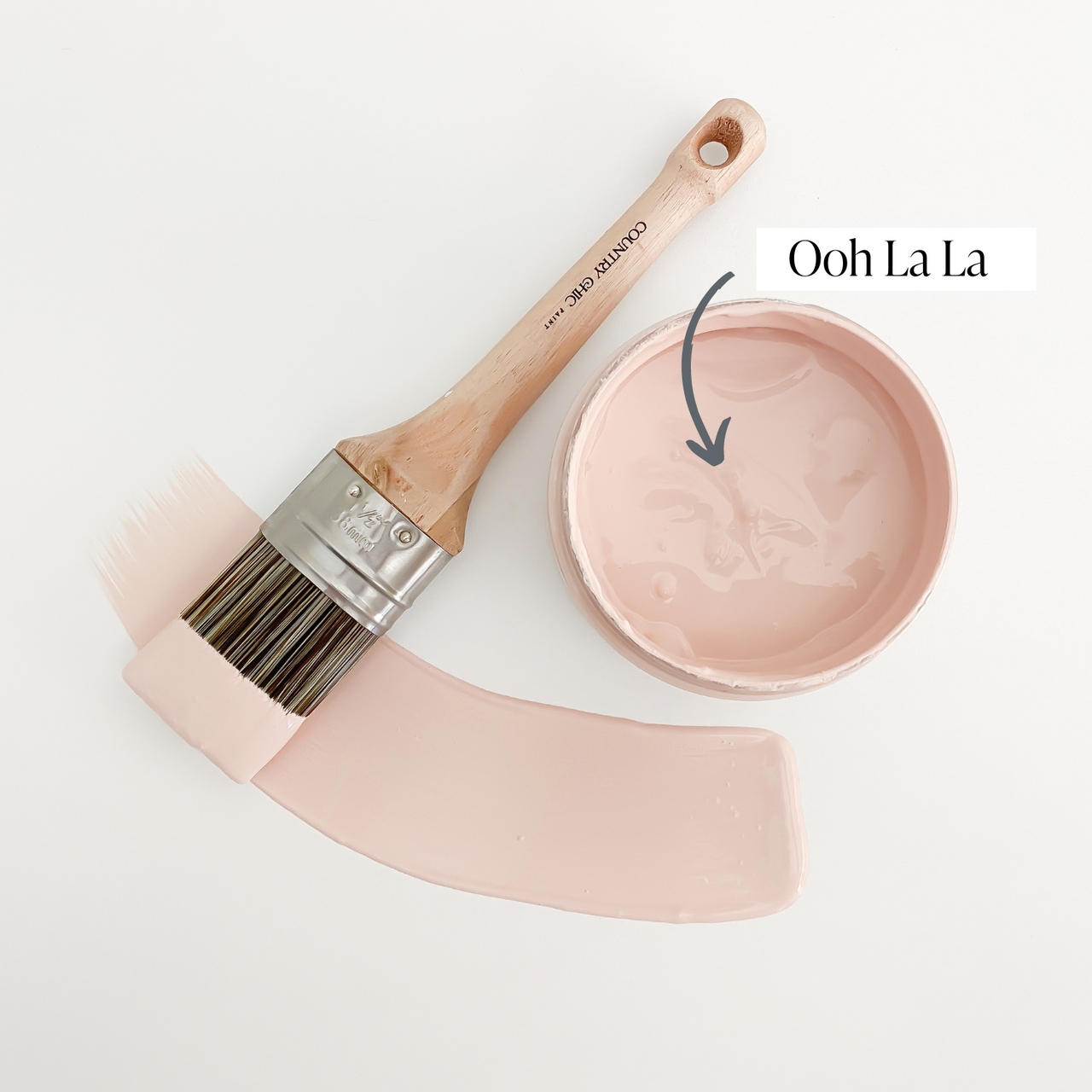 Top view of an open 16oz jar of Country Chic Chalk Style All-In-One Paint in the color Ooh la la. Blush pink.